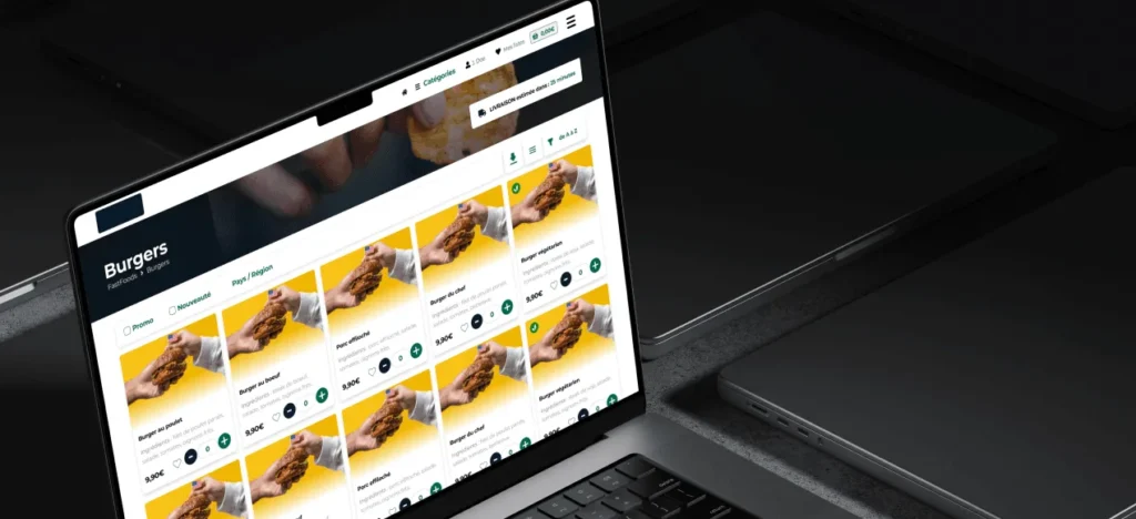 Ordinateur portable affichant le catalogue « Burgers » de NexusGreen, avec les fiches produits et leurs prix